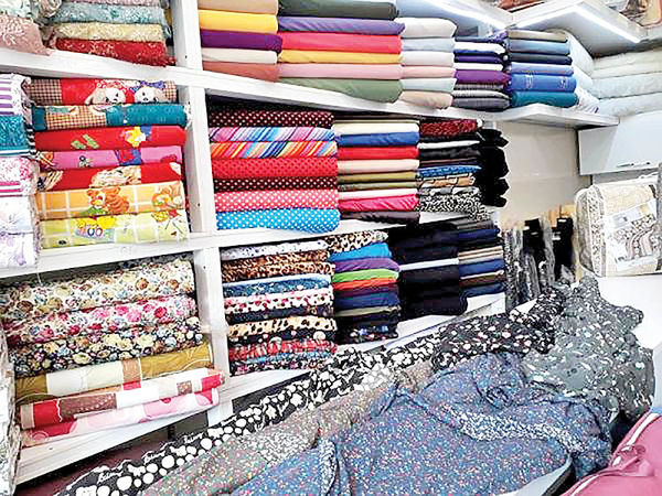 دلار با پارچه دست بهگریبان شد دلار با پارچه دست بهگریبان شد