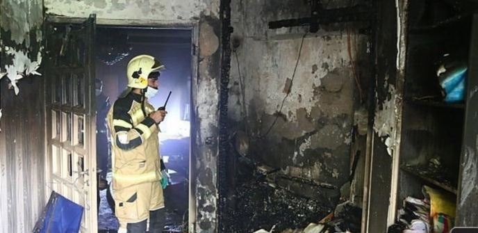 نجات ۱۲ نفر از میان آتش و دود در ملاصدرا + عکس نجات ۱۲ نفر از میان آتش و دود در ملاصدرا + عکس