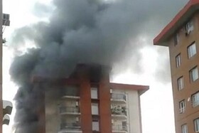 نجات ۶۰ نفر از آتش سوزی ساختمان ۴۰ واحدی در تهران + عکس
