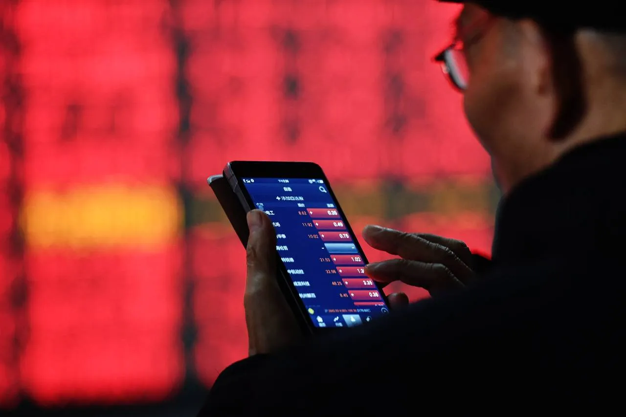 Market Turmoil Eases as Investors Weigh Trump’s Plan for Economy