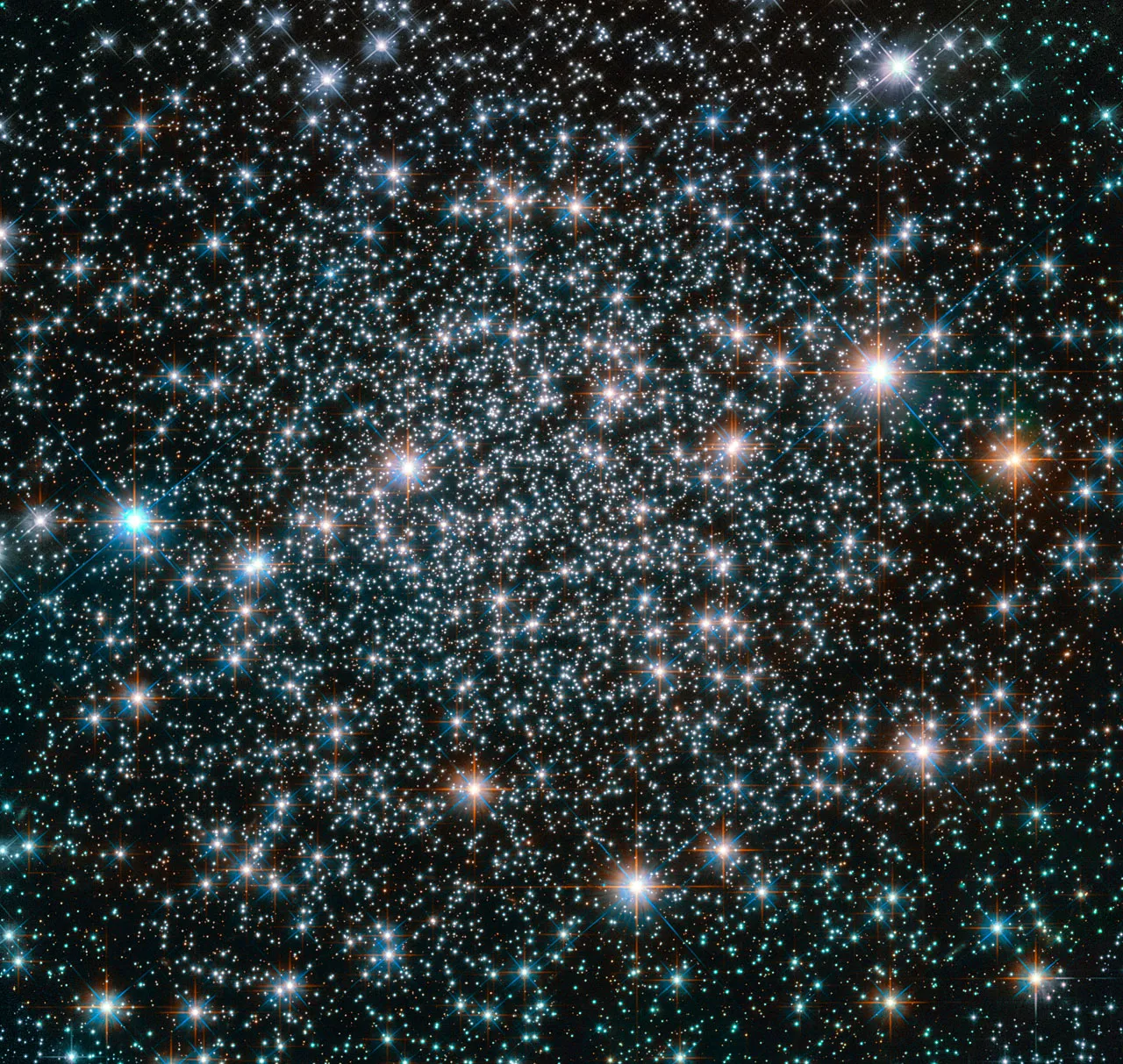 Hubble Uses Gravitational Lens to Look Back at Early Universe