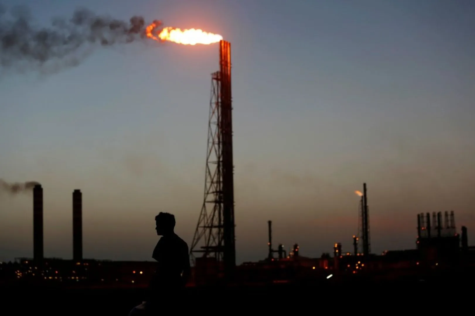 Oil hits August high on potential producer action to prop up market