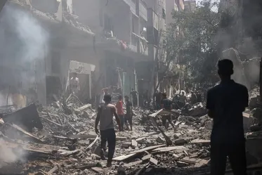 Charred bodies found in school as Israelis kill dozen Gazans