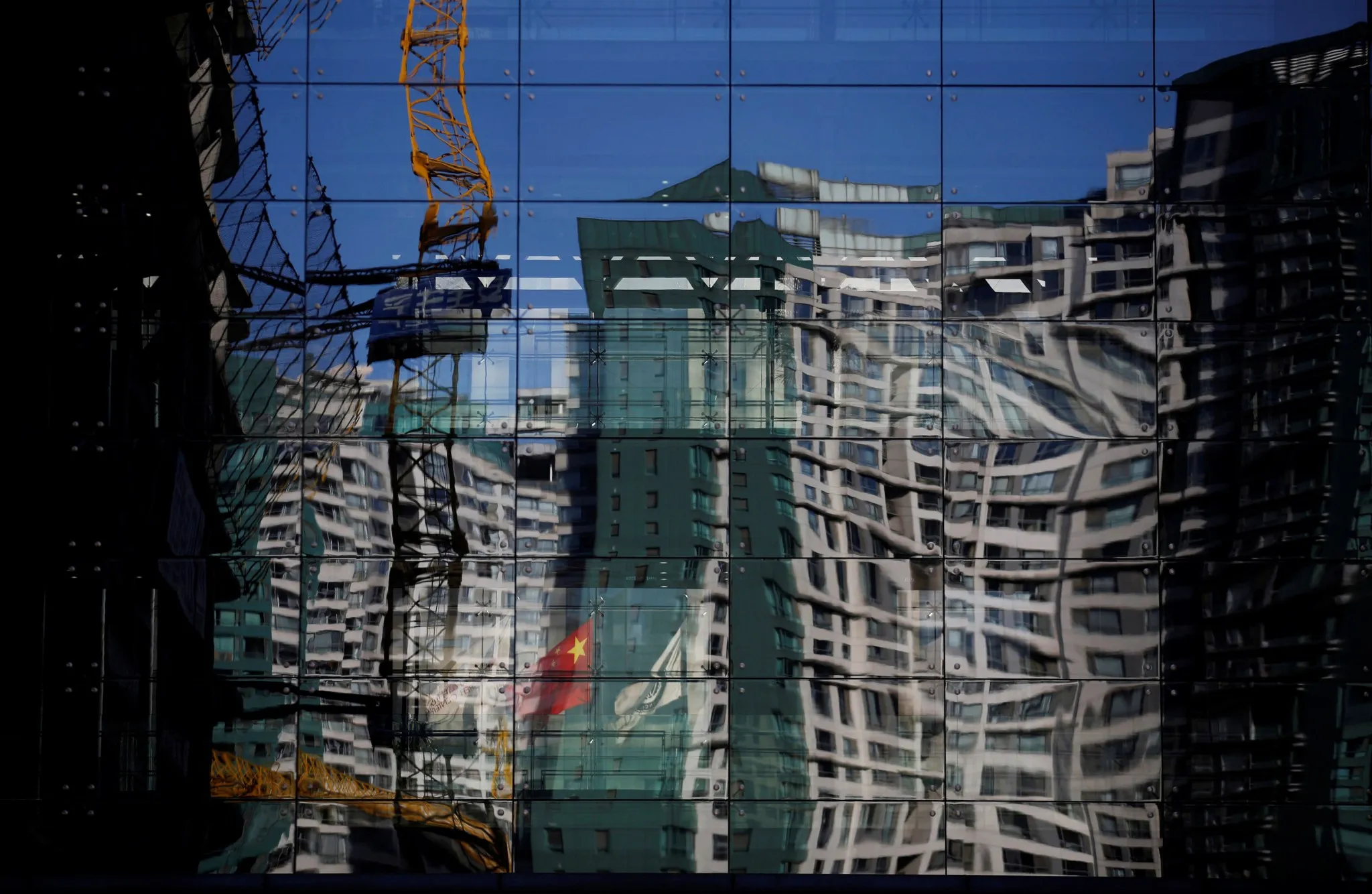 China Sets Growth Target of About 6.5% Amid Pledges to Ease Risk