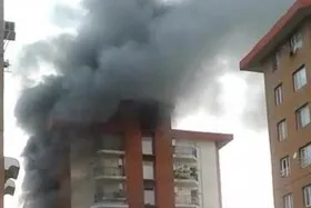 نجات ۶۰ نفر از آتش سوزی ساختمان ۴۰ واحدی در تهران + عکس