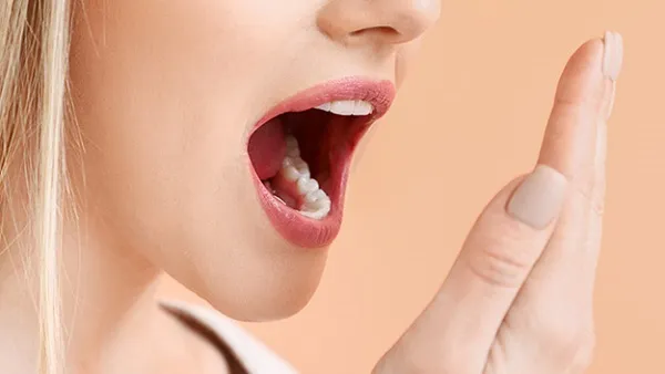 چرا دهن بوی بدی می‌دهد؟