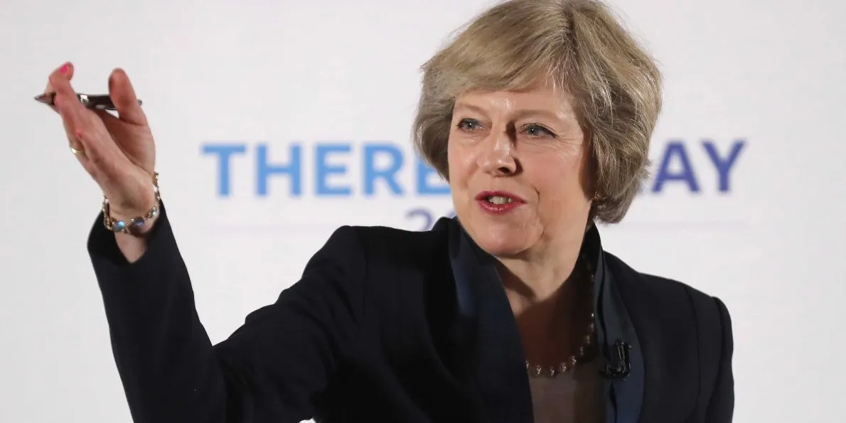 May Faces Rough Ride From France on Brexit If Macron Wins Vote