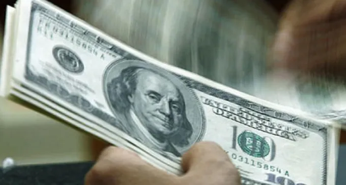 Dollar edges back towards 14-year peak as U.S. debt yields rise