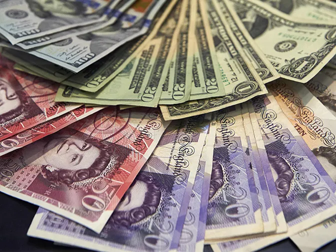 Dollar recovers from two-week lows in holiday-thinned market