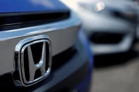 Japan's Honda ties up with ride-hailing service Grab