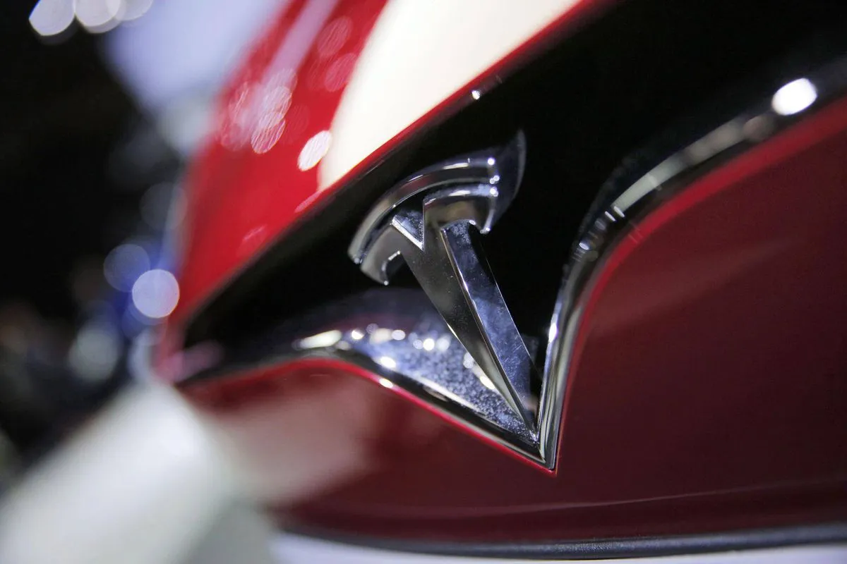 Tesla reaffirms effort to build cars in China; mum on deal report