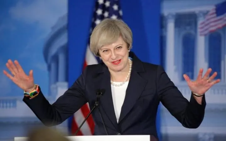 May Preaches Free Trade in U.S. as Trump Turns Up Heat on Mexico